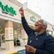 Man celebrating with ticket outside Publix store