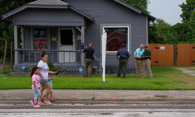 Police outside small psychic shop in neighborhood