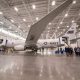 U.S. Navy aircraft inside large maintenance hangar