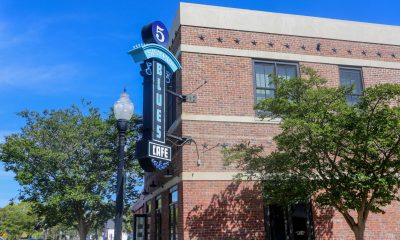5 Sisters Blues Cafe sign on brick building