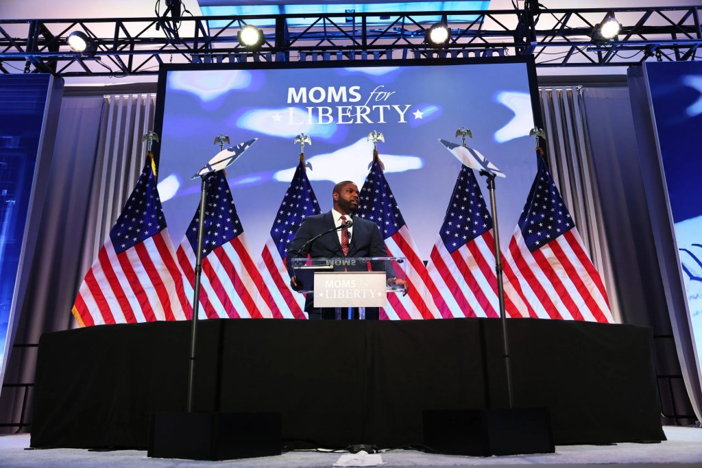 Speaker at Moms for Liberty event stage