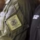 DHS Special Response Team patch on uniform sleeve