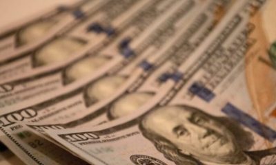 Stack of US hundred-dollar bills