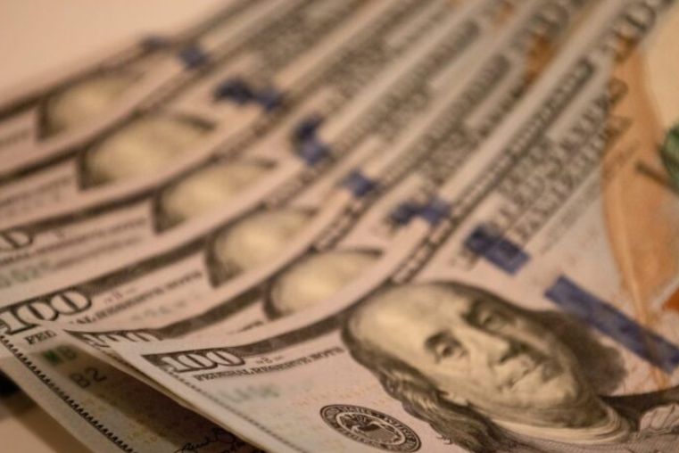 Stack of US hundred-dollar bills