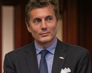 Man in suit and tie indoors