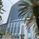 Modern United States courthouse with palm tree