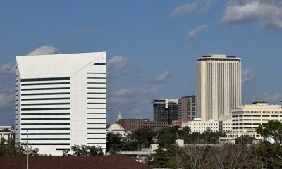 Modern city skyline with white and beige office towers