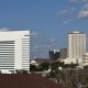 Modern city skyline with white and beige office towers