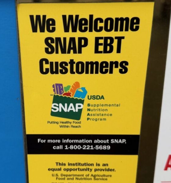 Store sign welcoming SNAP EBT customers — SNAP cuts Pensacola