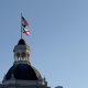 Domed building with U.S. and Florida flags