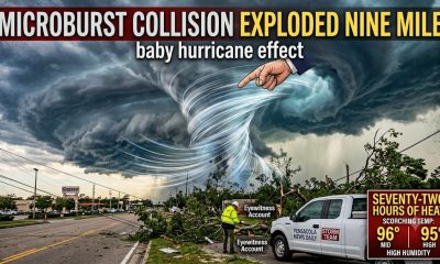 Dramatic storm microburst forming over city street