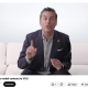 Man speaking on couch in YouTube video