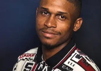 Portrait of man in patterned shirt
