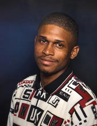 Portrait of man in patterned shirt
