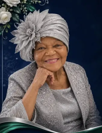 Elegant elderly woman in silver outfit and hat