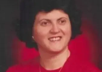 Woman in red top studio portrait
