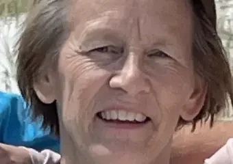 Smiling older woman outdoors in daylight