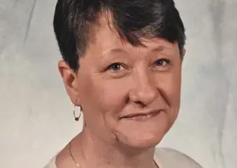 Portrait of woman with short dark hair
