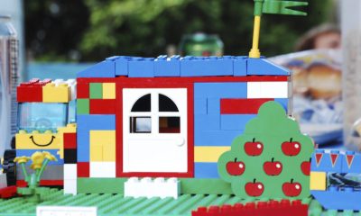 Colorful LEGO house with apple tree and truck