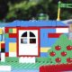 Colorful LEGO house with apple tree and truck