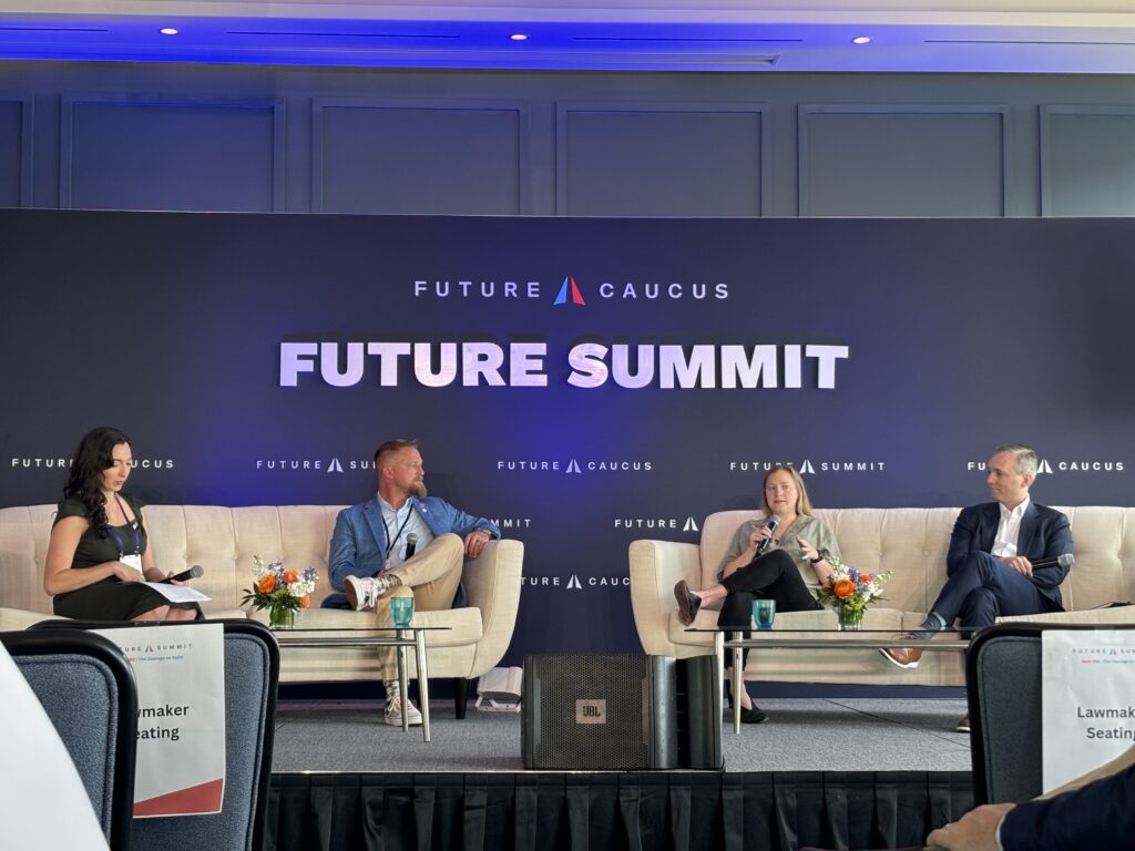 Panel discussion at Future Summit conference stage