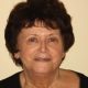 Portrait of older woman with short dark hair