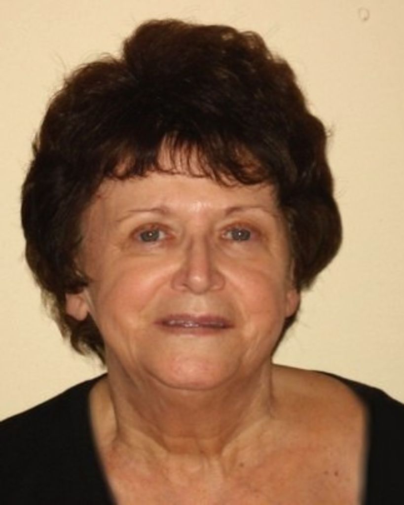 Portrait of older woman with short dark hair