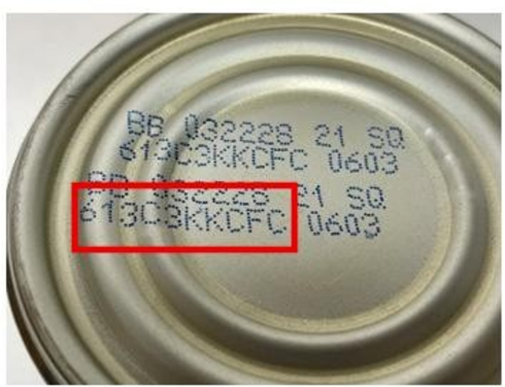 Close-up of can bottom with printed code