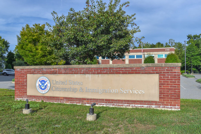 USCIS brick sign outside government building
