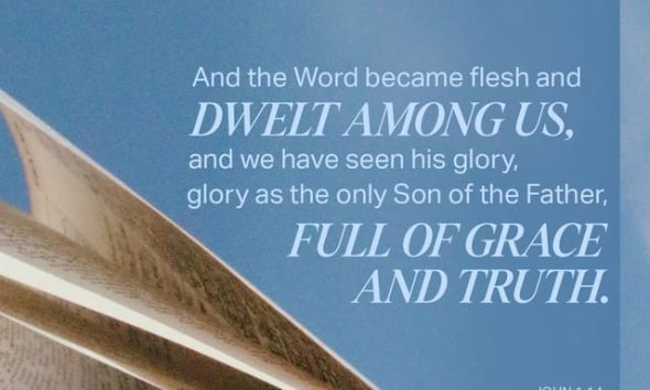 Open Bible pages with a blue sky background, featuring John 1:14 text about the Word becoming flesh. — John 1 14