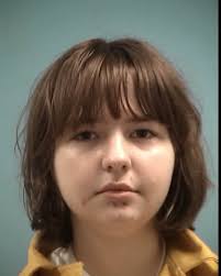 Portrait of young woman with brown bob haircut