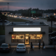 China Delight restaurant in Cantonment with customers picking up takeout at dusk along Highway — China Delight Cantonment