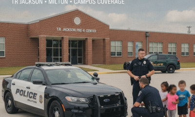Milton Police officers interact with children outside T.R. Jackson Pre-K Center amid SRO d — TR Jackson SRO dispute Milton
