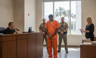 A man in an orange jumpsuit stands before a judge in a courtroom, flanked by law enforce — Jeremy Jovan Randolph sentenced