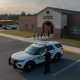Milton police vehicle parked outside T.R. Jackson Pre-K Center as students arrive for schoo — Milton police TR Jackson SRO