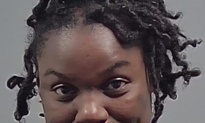 Close-up portrait of smiling man with short dreadlocks — Cantonment shed shooting