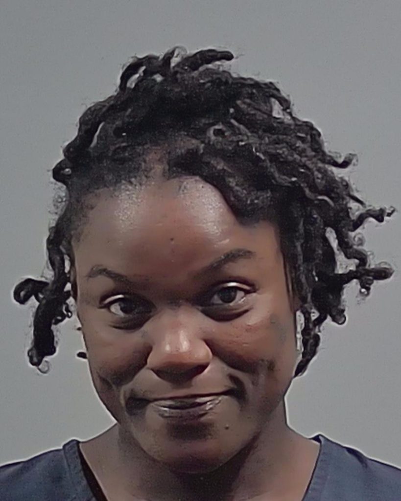 Close-up portrait of smiling man with short dreadlocks — Cantonment shed shooting
