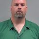 Eric Douglas McClure with goatee wearing a green collared shirt — Flomaton parents attempted murder