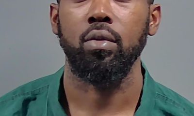 Close-up portrait of bearded man in green collared shirt — Pensacola Gas Station Murder Conviction