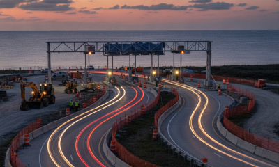 Traffic shifts on Pensacola Beach Boulevard with construction equipment and electronic — Pensacola Beach Boulevard Traffic