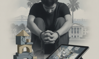 A young man with hands bound sits with his head down, surrounded by a broken toy structu — Trinity Joy Johnson Gainesville