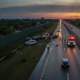 Emergency crews respond to a multi-vehicle crash on US 98 near Hurlburt Field at sunset, with — US 98 crash Hurlburt Field