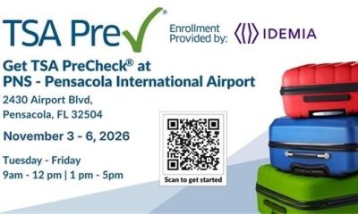 TSA PreCheck Pensacola International Airport enrollment flyer with a QR code and stacked colorful suitcases