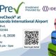 TSA PreCheck Pensacola International Airport enrollment flyer with a QR code and stacked colorful suitcases