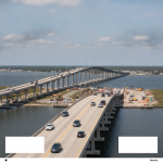 View of reopened Pensacola Bay Bridge with vehicles traveling and construction activity visib — Pensacola Bridges Reopened