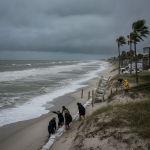 Residents in Escambia County prepare for Tropical Depression Nine by placing sandbags — Tropical Depression Nine Pensacola